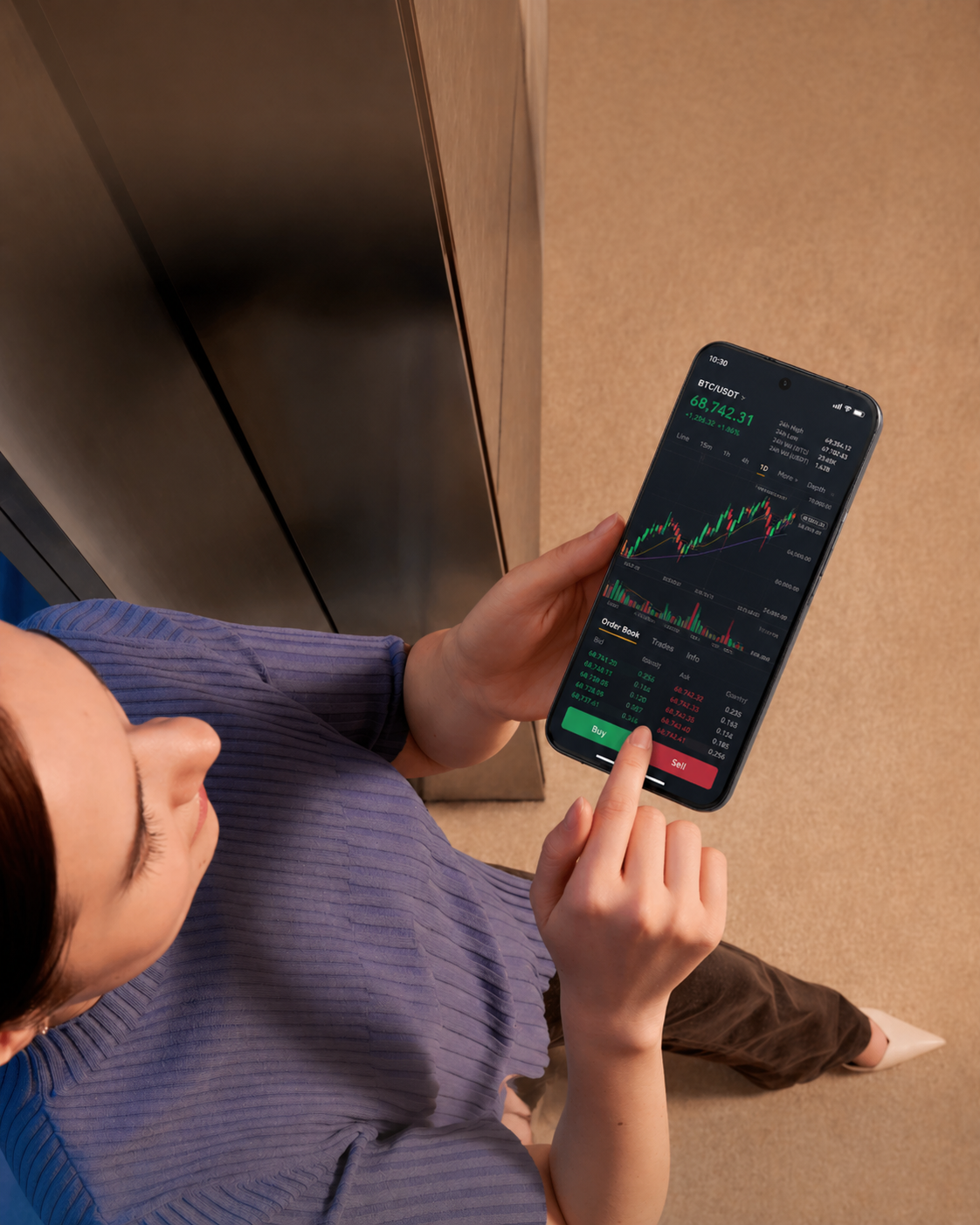 Trader viewing a live market on a phone