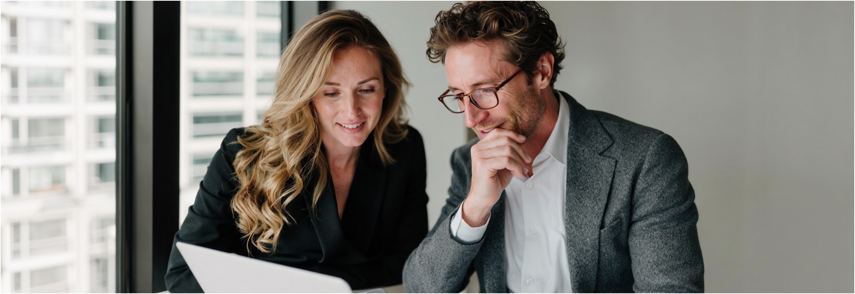 TradeQuo traders reviewing their market platform